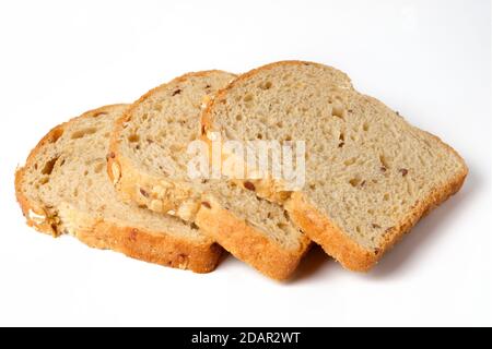 Three slices of whole grain bread with seeds isolated on white Stock Photo