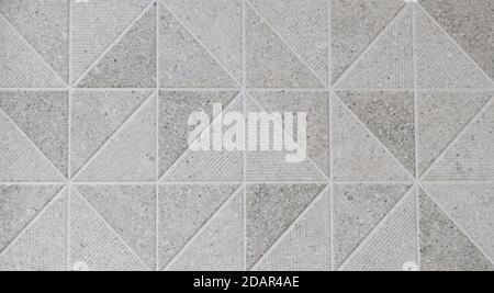 texture of decorative tiles forming triangles Stock Photo