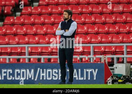 Russell Martin, manager of Milton Keynes Dons, watches the action Stock Photo