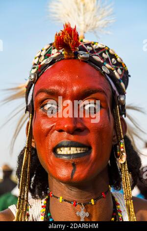 Wodaabe-Bororo man with face painted at the annual Gerewol festival, courtship ritual competition among the Fulani ethnic group, Niger Stock Photo