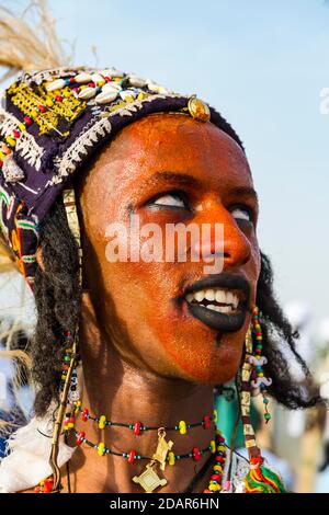 Wodaabe-Bororo man with face painted at the annual Gerewol festival, courtship ritual competition among the Fulani ethnic group, Niger Stock Photo