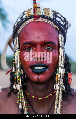 Wodaabe-Bororo man with face painted at the annual Gerewol festival, courtship ritual competition among the Fulani ethnic group, Niger Stock Photo