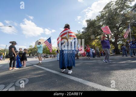 Austin, Texas, USA. 14th Nov, 2020. Hundreds of President Donald Trump's supporters rally between the Governor's Mansion and the Texas Capitol, adamant that the president should not concede to Joe Biden until cases of election fraud are investigated and all votes counted. So far no widespread cases of illegal voting have arisen almost two weeks after the election. Credit: Bob Daemmrich/ZUMA Wire/Alamy Live News Stock Photo
