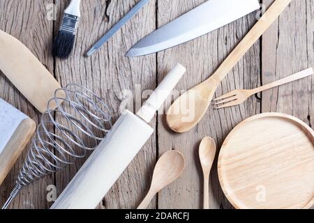 Set of wooden spoon,fork,knife, on old wooden table background,top view copy space for your product and cooking design Stock Photo
