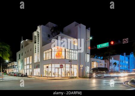 MIAMI BEACH, FL, USA - NOVEMBER 13, 2020: HNM H M store South Beach Miami at night Stock Photo