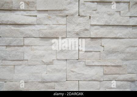 White stone bricks texture, exterior rough geometric pattern Stock Photo
