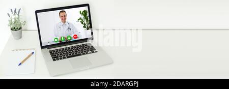 Doctor Video Chatting On Laptop Stock Photo
