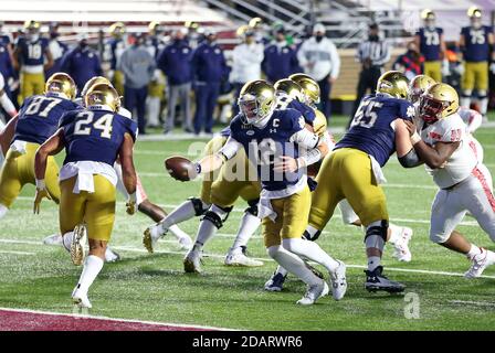 Alumni Stadium. 14th Nov, 2020. MA, USA; Notre Dame Fighting Irish quarterback Ian Book (12) and Notre Dame Fighting Irish tight end Tommy Tremble (24) in action during the NCAA football game between Notre Dame Fighting Irish and Boston College Eagles at Alumni Stadium. Anthony Nesmith/CSM/Alamy Live News Stock Photo