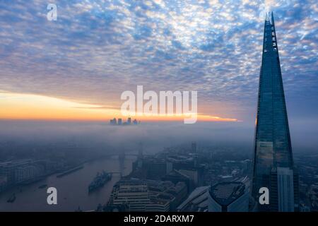 Stunning aerial view over Thames river, the Shard, the London skyline and cityscape Stock Photo
