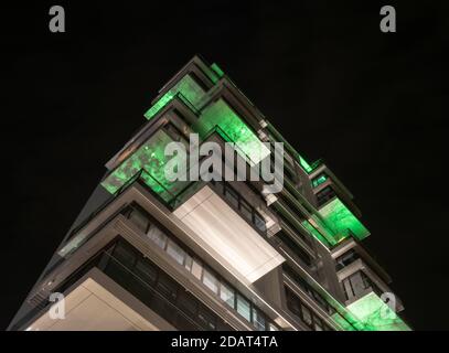 Berlin, Germany. 14th Nov, 2020. The balconies of a high-rise residential building on the East Side Gallery are brightly lit. (long time exposure) Credit: Paul Zinken/dpa/Alamy Live News Stock Photo