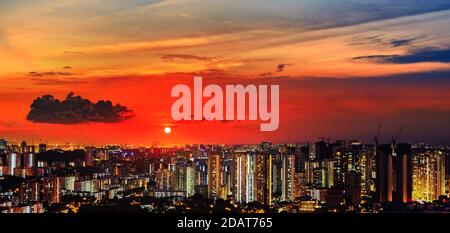 skyline of singapore city with a sunset Stock Photo