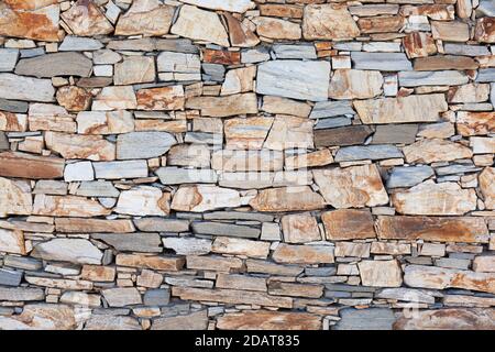 Rustic stone wall texture or background Stock Photo