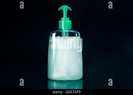 Hand sanitizer on a black background. photo with a copy-space. Stock Photo