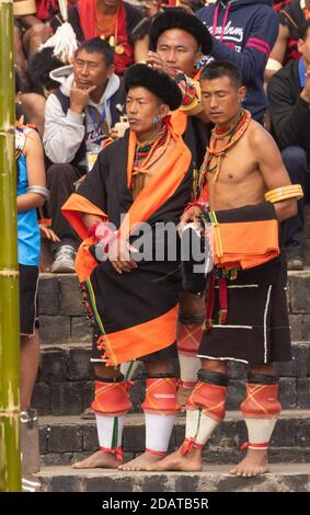 Naga tribesmen  wearing their traditional attire and standing together in Kisama heritage Village arena  in Nagaland India on 4 December 2016 Stock Photo