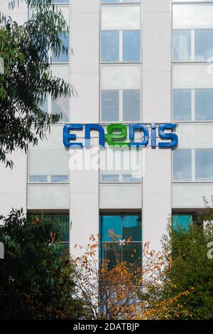 Courbevoie, France - November 12, 2020: Logo on the Enedis tower in the business district of Paris La Défense Stock Photo