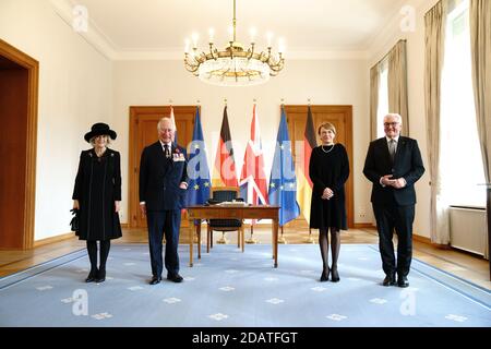 15 November 2020, Berlin: Prince Charles and his wife Camilla are standing next to Federal President Frank-Walter Steinmeier (r) and his wife Elke Büdenbender (2nd from right) before a conversation in Bellevue Palace. The Prince of Wales and the Duchess of Cornwall are in Berlin on the occasion of the central commemoration of the Volkstrauertag. This year's national day of mourning in memory of the victims of National Socialism and the dead of both world wars is dedicated to German-British friendship. Photo: Kay Nietfeld/dpa Stock Photo