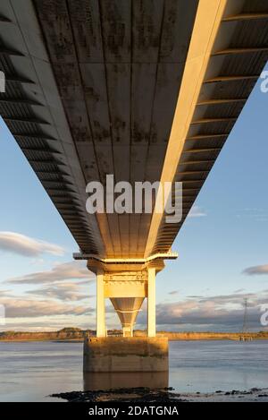 Late Sun on the underside of The Severn Bridge at Beachley Old Ferry, Gloucestershire, UK Stock Photo