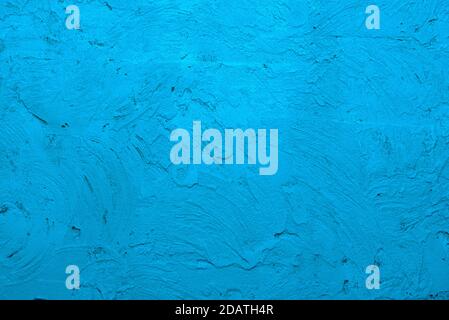 Blue background made with a texture of a plaster wall Stock Photo