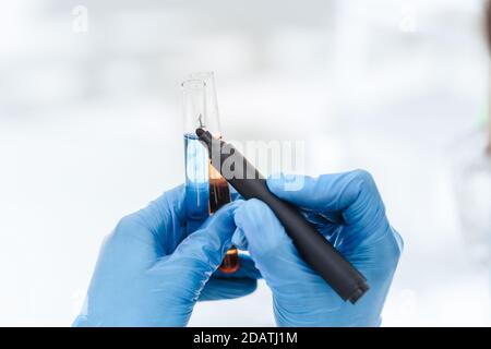 close up. scientist marks the tubes with tests. Stock Photo