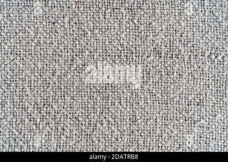 The texture of a dense white woolen fabric. Close-up textile background. Stock Photo
