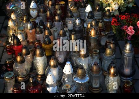 Candles at a cemetery during all Saints Day,Wszystkich Swietych in Poland. Stock Photo