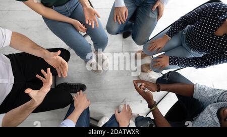 Diverse people group sitting in circle on mental therapy session Stock Photo