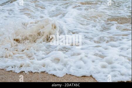 Sunshine pouring over the sea  through the clouds view from beach of somnath temple Gujarat India Stock Photo