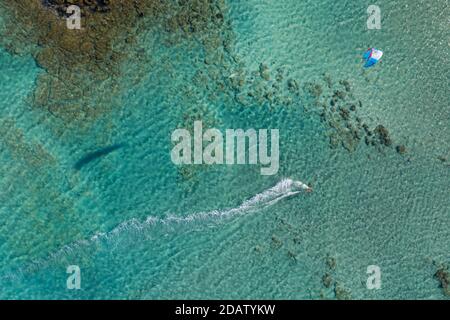 Aerial view of a kitesurfer in shallow clear water at Elafonisi Beach, one of the most popular tourist destinations in the southwest of Crete, Greece Stock Photo