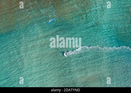 Aerial view of a kitesurfer in shallow clear water at Elafonisi Beach, one of the most popular tourist destinations in the southwest of Crete, Greece Stock Photo