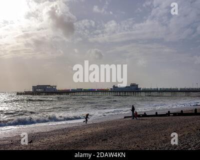 A family play on the beach on a Sunny November Sunday during Lockdown 2 on Sunday 15 November 2020 at The Seafront, Worthing. . Picture by Julie Edwar Stock Photo