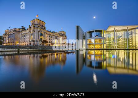 The Reichtsag and the Paul-Loebe-Haus at the river Spree in Berlin at dawn Stock Photo