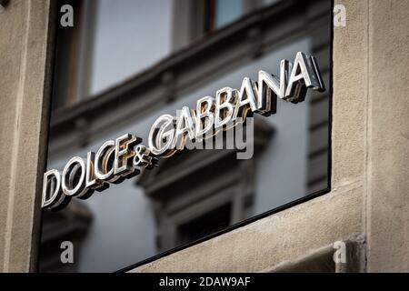 Closeup of the Dolce & Gabbana corporate logo above the shop window of a luxury boutique in Florence downtown. Tuscany, Italy, Europe. Stock Photo