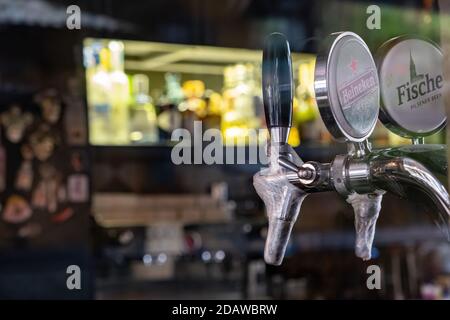 Athens, Greece. November 12, 2020. Beer tap sealed closeup view, pub closed, covid 19 lockdown. Coronavirus pandemic prevention measure Stock Photo