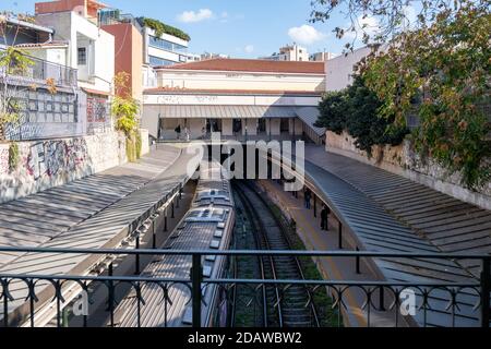 Athens, Greece. November 10, 2020. Monastiraki metro station, people waiting at the outdoor platform, wearing COVID 19 protective face masks, view fro Stock Photo