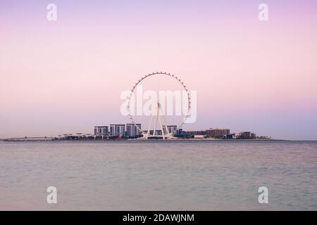 Beautiful sunset from Jumeirah Beach Residence overlooking Bluewaters Dubai Stock Photo