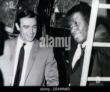 Dec. 16, 1967 - London, England, Untied Kingdom - In London's East End actor SIDNEY POITIER, right, has his hands full playing the role of a young teacher in the technicolor film 'To Sir with Love.' Poitier had the opportunity to speak with SEAN CONNERY, left, at Pinewood Studios during a break from fimling. (Credit Image: © Keystone Press Agency/Keystone USA via ZUMAPRESS.com) Stock Photo