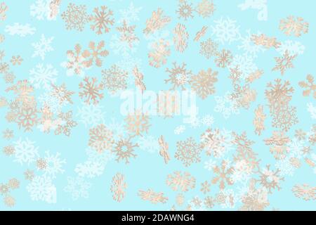 Beautiful snowflake pattern white and gold falling on a sky blue background Stock Photo