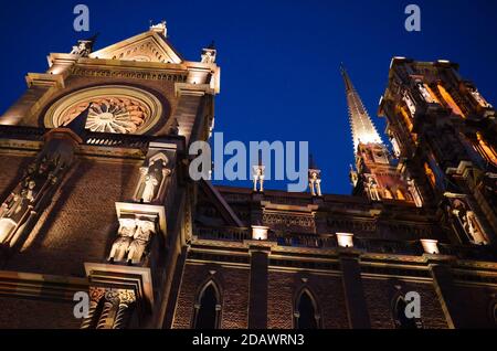 Low angle view of Iglesia De Los Capuchinos Church in the night. Franciscan catholic church in neo-gothic style. Cordoba, Argentina Stock Photo