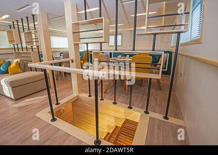 Interior design furnishing decor of the salon area in a large luxury motor yacht Stock Photo