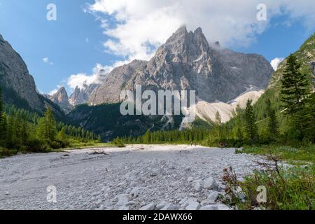 View into the valley Val Fiscalina in Sesto with the beautiful rock formations of the UNESCO World Heritage of the Dolomites mountains. Stock Photo
