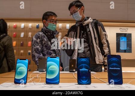 Apple iPhone 12 series seen on display at an Apple store after the launch of the new iPhone 12 series smartphones. Stock Photo