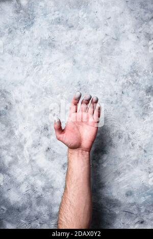 Man hand covered with paint Stock Photo