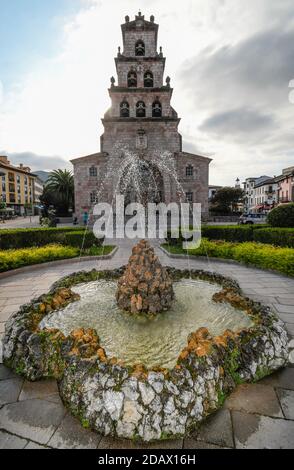 Church of the Assumption of Cangas de Onís, with the fountain in the foreground Stock Photo