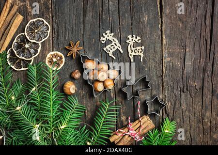 Christmas baking background. Ingredients for Christmas cooking or baking on rustic wooden table. Top view with copy space. Stock Photo