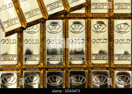 Top view of shiny gold bars stacked up in rows. Gold Bars 1000 grams. Concept of success in business and finance. Stock Photo