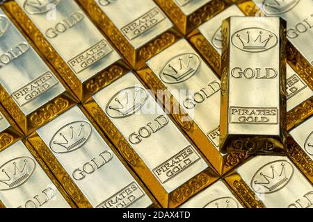 Top view of shiny gold bars stacked up in rows. Gold Bars 1000 grams. Concept of success in business and finance. Stock Photo