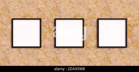 Empty picture frames gallery with square shapes on a marble wall with black frame. Blank Mockup for three images or photos. Stock Photo
