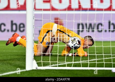 England's goalkeeper Jordan Pickford fails to stop a free kick of Belgium's Dries Mertens (not pictured) during the UEFA Nations League League A, Group 2 match at King Power Stadion At Den Dreefts, Leuven, Belgium. Stock Photo