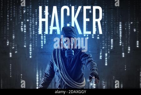 Faceless hacker with HACKER inscription, hacking concept Stock Photo