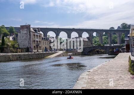 Dinan, France - August 26, 2019: Port of Dinan and Viaduct of Lanvallay over the Rance river in French Brittany Stock Photo